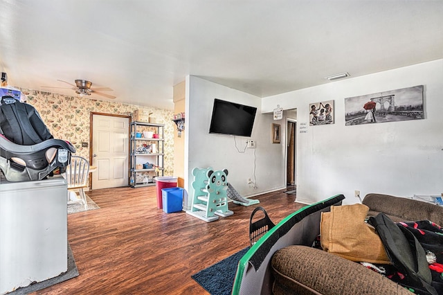 3201 E Mcberry St, Tampa, FL 33610 - living area featuring ceiling fan, wood finished floors, and wallpapered walls