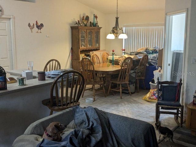 9761 Councilor Ln, North Fort Myers, FL 33917 - dining room with lofted ceiling and tile patterned floors