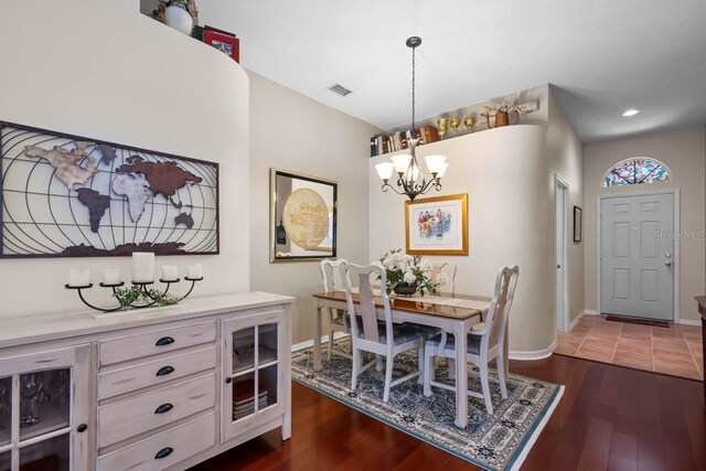 810 Erik Lake Rd, Brandon, FL 33510 - dining space with a chandelier, dark wood-style flooring, baseboards, and recessed lighting