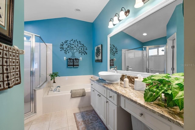 810 Erik Lake Rd, Brandon, FL 33510 - full bath featuring vaulted ceiling, vanity, a bath, and a shower stall