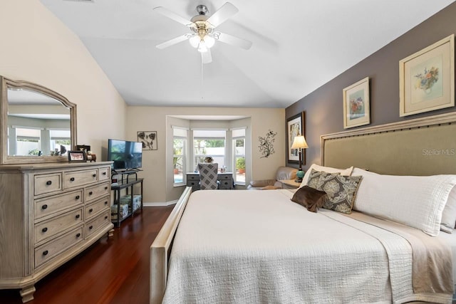 810 Erik Lake Rd, Brandon, FL 33510 - bedroom with lofted ceiling, dark wood-style flooring, a ceiling fan, and baseboards