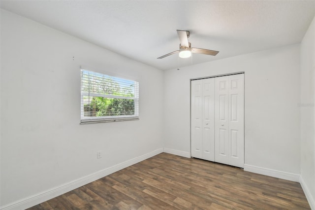 1311 W Perdiz St, Tampa, FL 33612 - unfurnished bedroom featuring wood finished floors, a closet, and a ceiling fan