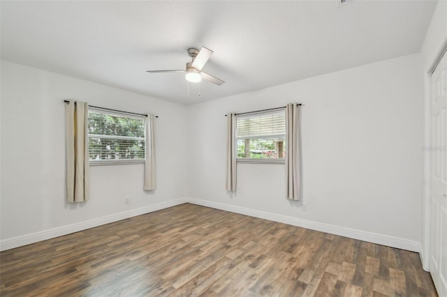 1311 W Perdiz St, Tampa, FL 33612 - spare room featuring plenty of natural light, wood finished floors, and ceiling fan