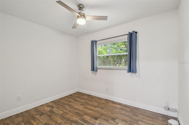 1311 W Perdiz St, Tampa, FL 33612 - spare room featuring dark wood-style flooring and a ceiling fan