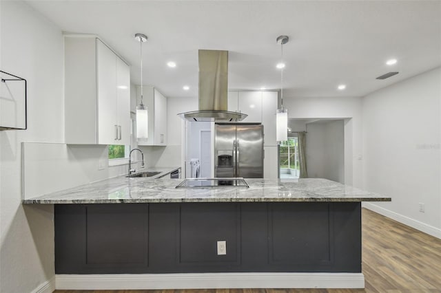 1311 W Perdiz St, Tampa, FL 33612 - kitchen with stainless steel refrigerator with ice dispenser, island range hood, white cabinetry, a peninsula, and recessed lighting