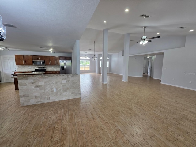 13551 Banner Rd, Spring Hill, FL 34609 - kitchen with appliances with stainless steel finishes, light wood-style floors, ceiling fan, open floor plan, and recessed lighting