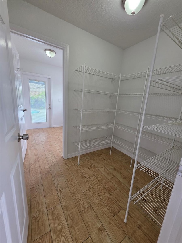 13551 Banner Rd, Spring Hill, FL 34609 - walk in closet with hardwood / wood-style floors