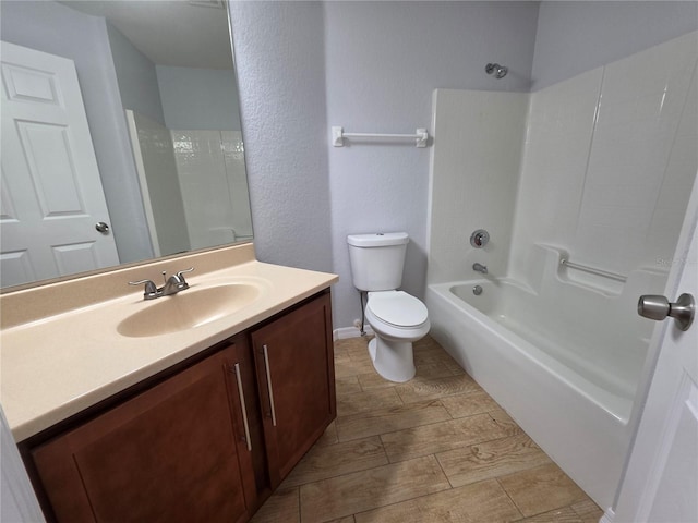 13551 Banner Rd, Spring Hill, FL 34609 - bathroom with vanity, toilet, and shower / bathtub combination