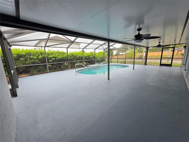 13551 Banner Rd, Spring Hill, FL 34609 - swimming pool with a patio area, ceiling fan, and glass enclosure