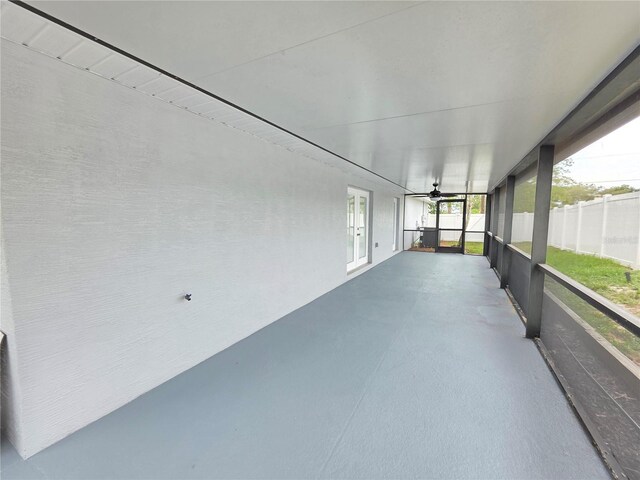 13551 Banner Rd, Spring Hill, FL 34609 - unfurnished sunroom with a ceiling fan and french doors