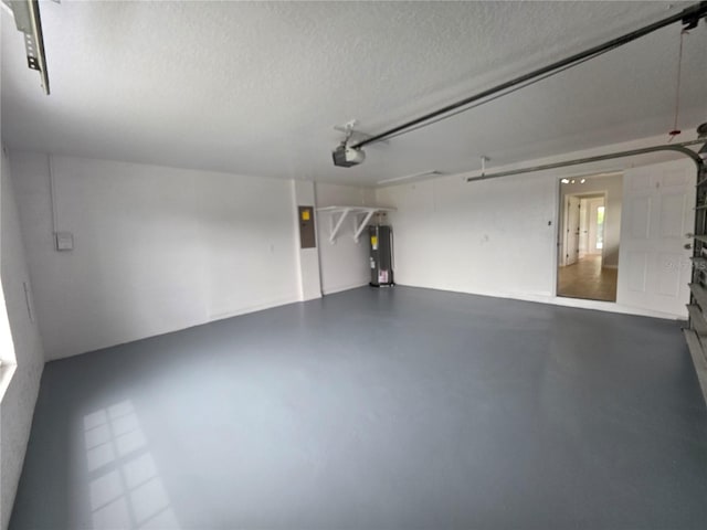 13551 Banner Rd, Spring Hill, FL 34609 - garage featuring water heater, a garage door opener, and electric panel