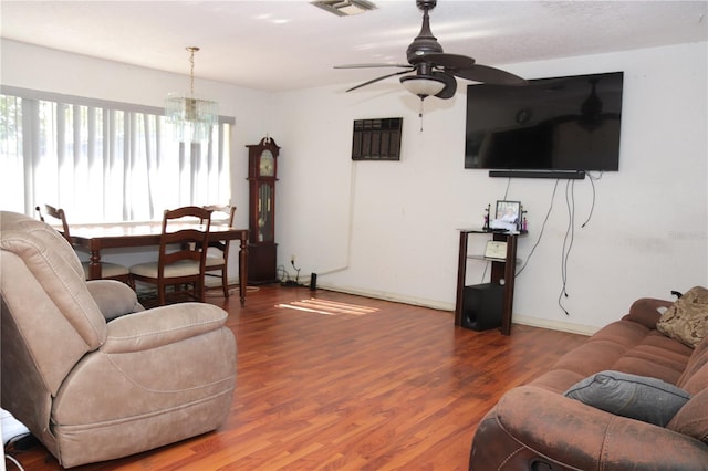 1701 NW 10th Ave, Fort Lauderdale, FL 33311 - living room featuring a chandelier, a ceiling fan, and wood finished floors