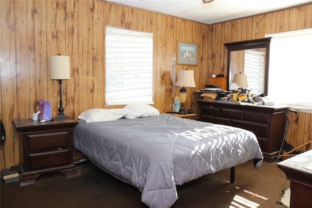 1701 NW 10th Ave, Fort Lauderdale, FL 33311 - bedroom with multiple windows, carpet flooring, and wood walls