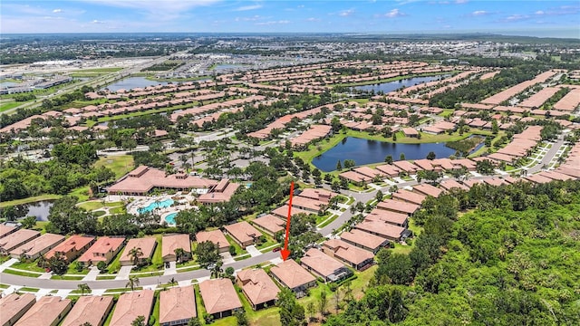 137 Silver Falls Dr, Apollo Beach, FL 33572 - aerial overview of property's location featuring nearby suburban area and a large body of water