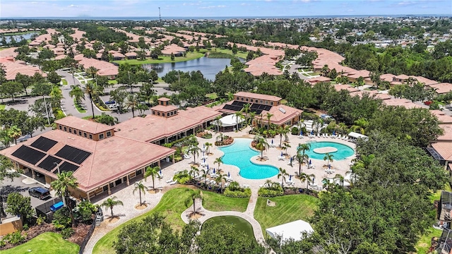 137 Silver Falls Dr, Apollo Beach, FL 33572 - aerial view of a pool area and a nearby body of water