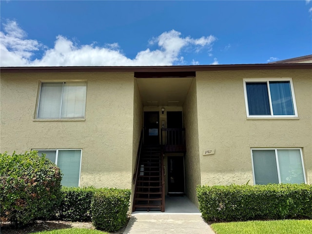 4215 E Bay Dr Unit 1707C, Clearwater, FL 33764 - view of exterior entry with stucco siding
