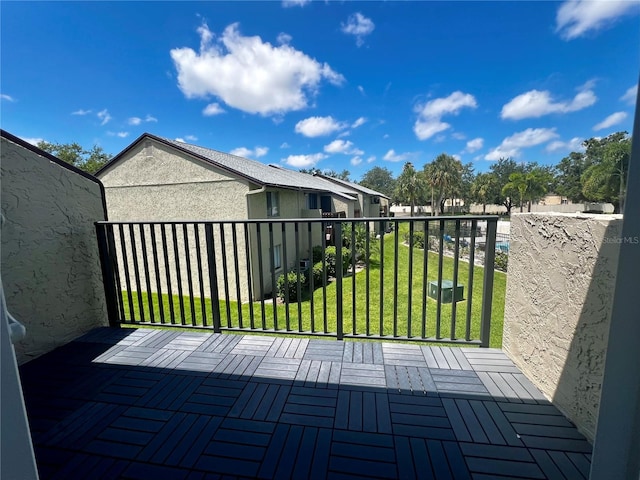 4215 E Bay Dr Unit 1707C, Clearwater, FL 33764 - wooden deck with a lawn