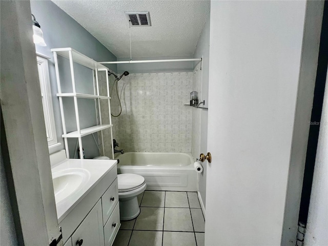 4215 E Bay Dr Unit 1707C, Clearwater, FL 33764 - bathroom with toilet, tile patterned floors, vanity, shower / bath combination, and a textured ceiling