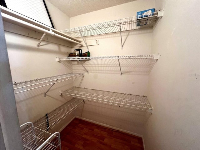 4215 E Bay Dr Unit 1707C, Clearwater, FL 33764 - walk in closet with wood finished floors