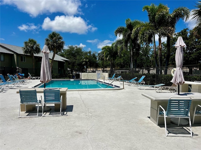 4215 E Bay Dr Unit 1707C, Clearwater, FL 33764 - community pool with a patio