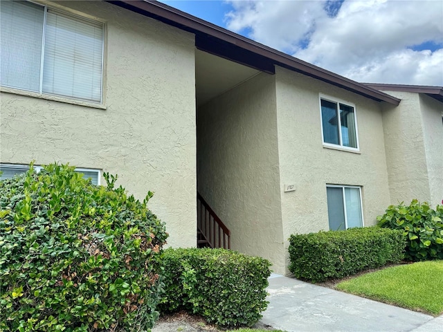 4215 E Bay Dr Unit 1707C, Clearwater, FL 33764 - view of side of property with stucco siding