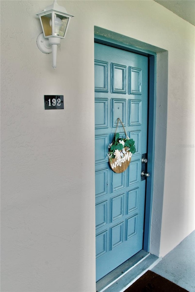 2737 Enterprise Rd E Unit 192, Clearwater, FL 33759 - view of exterior entry featuring stucco siding