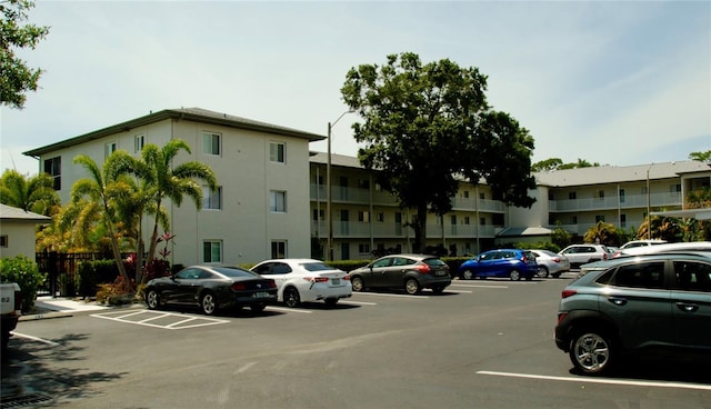 2737 Enterprise Rd E Unit 192, Clearwater, FL 33759 - view of apartment building / complex featuring uncovered parking