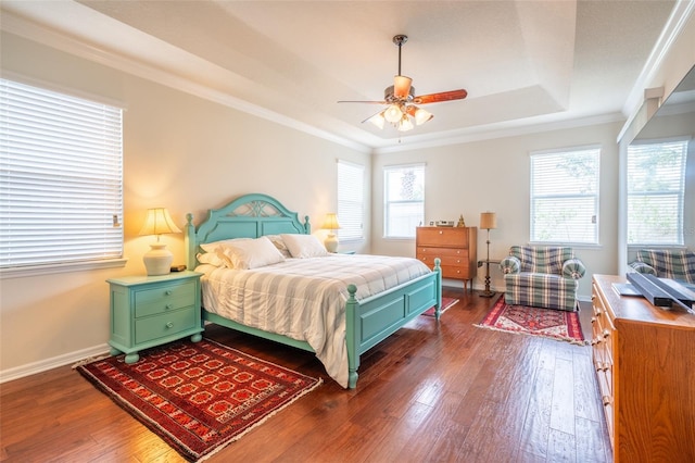 11038 Spring Point Cir, Riverview, FL 33579 - bedroom featuring dark wood-style floors, crown molding, a raised ceiling, and a ceiling fan