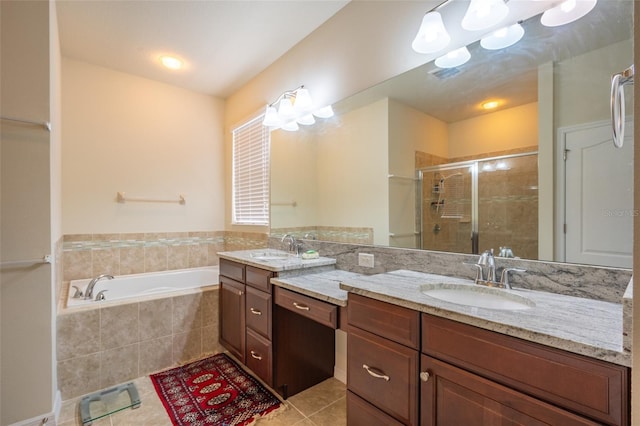 11038 Spring Point Cir, Riverview, FL 33579 - bathroom with double vanity, tile patterned floors, a stall shower, a bath, and a chandelier