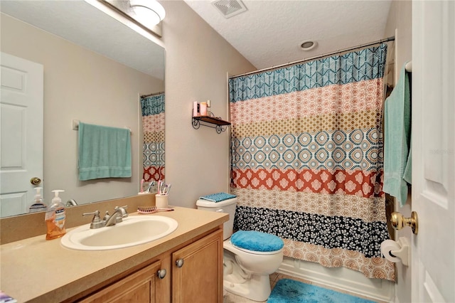 213 Draw Bridge Ln, Valrico, FL 33594 - full bathroom featuring toilet, vanity, and a textured ceiling