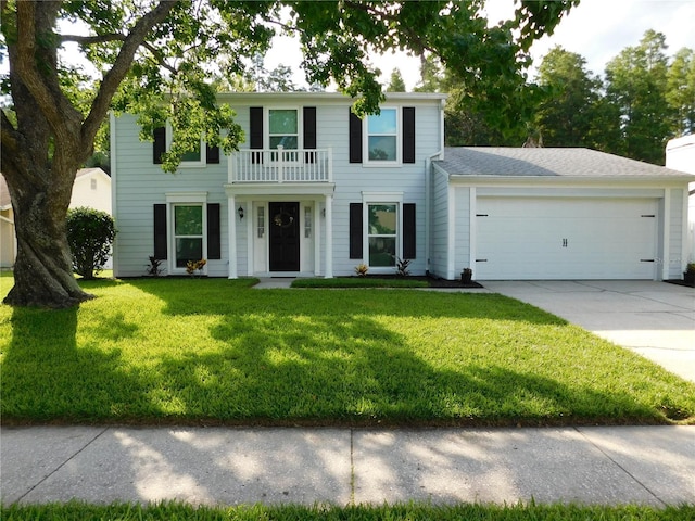 15916 Marshfield Dr, Tampa, FL 33624 - colonial-style house with concrete driveway, an attached garage, a front lawn, and a balcony