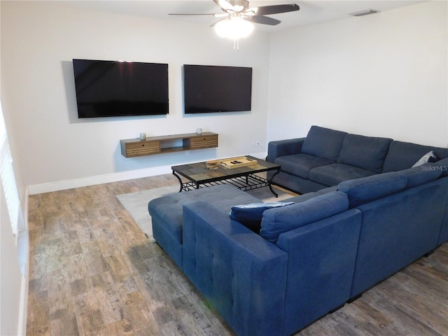 15916 Marshfield Dr, Tampa, FL 33624 - living area with ceiling fan and wood finished floors