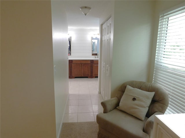 15916 Marshfield Dr, Tampa, FL 33624 - hallway with light tile patterned flooring