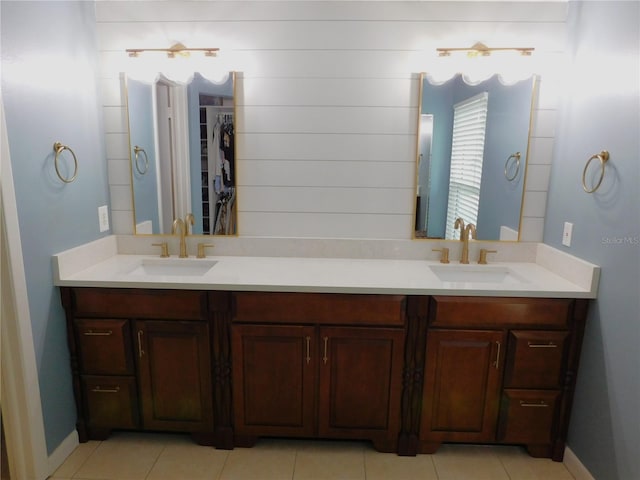 15916 Marshfield Dr, Tampa, FL 33624 - full bathroom featuring double vanity, tile patterned floors, and a walk in closet