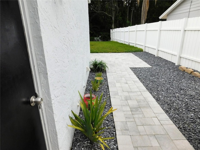 15916 Marshfield Dr, Tampa, FL 33624 - view of yard featuring a patio area