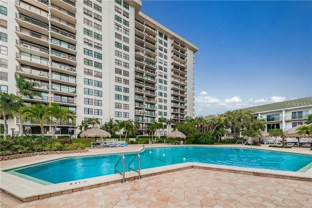400 Island Way Unit 1606, Clearwater Beach, FL 33767 - community pool featuring a patio area