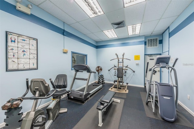 400 Island Way Unit 1606, Clearwater Beach, FL 33767 - gym featuring a paneled ceiling and baseboards