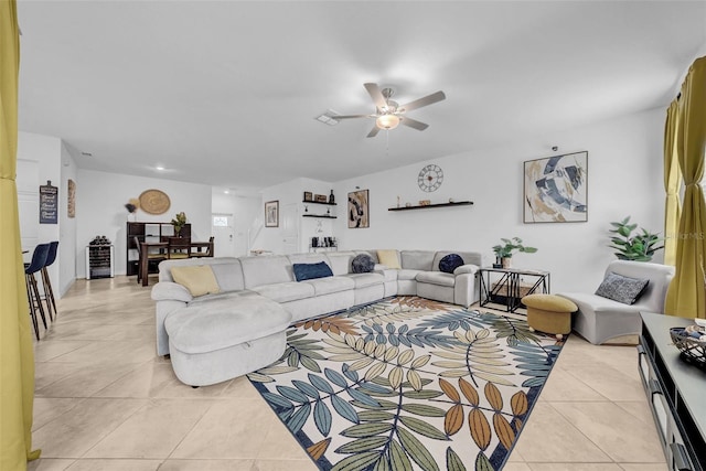 3216 Bryant Park Dr, New Port Richey, FL 34655 - living area featuring light tile patterned floors and ceiling fan