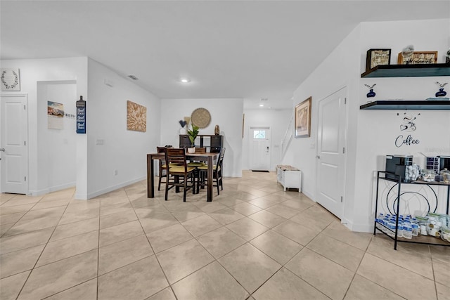 3216 Bryant Park Dr, New Port Richey, FL 34655 - dining space with light tile patterned flooring, recessed lighting, and baseboards