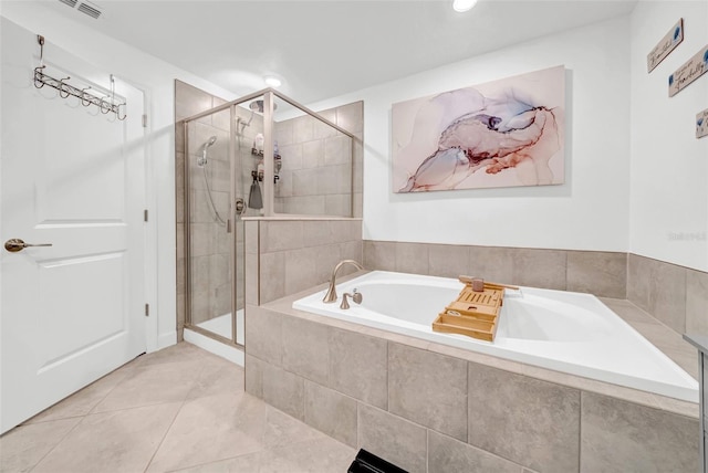 3216 Bryant Park Dr, New Port Richey, FL 34655 - full bathroom featuring a garden tub, a shower stall, tile patterned flooring, and recessed lighting
