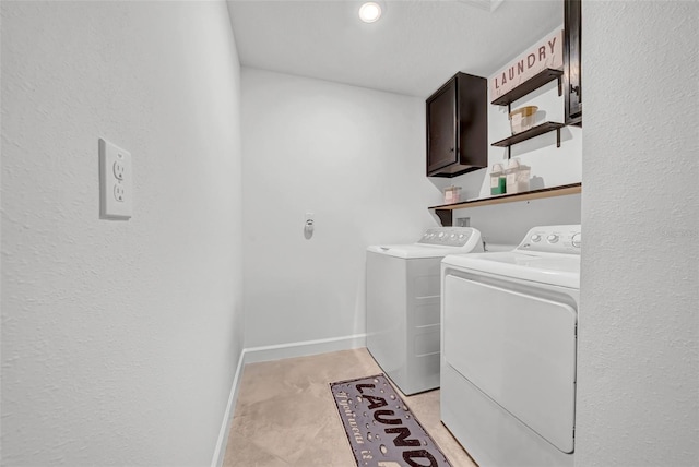 3216 Bryant Park Dr, New Port Richey, FL 34655 - laundry room with cabinet space, washer and clothes dryer, and baseboards