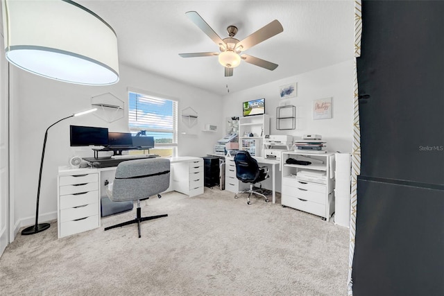 3216 Bryant Park Dr, New Port Richey, FL 34655 - home office featuring a ceiling fan and carpet
