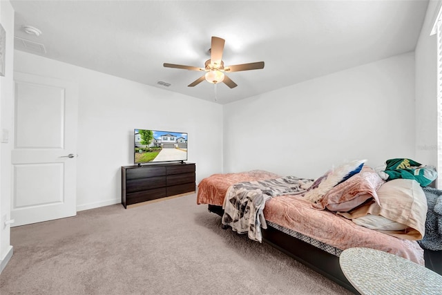3216 Bryant Park Dr, New Port Richey, FL 34655 - carpeted bedroom with ceiling fan and baseboards