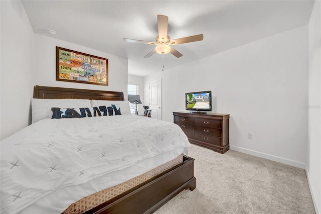 3216 Bryant Park Dr, New Port Richey, FL 34655 - bedroom featuring light colored carpet, baseboards, and a ceiling fan