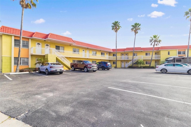 4103 Gulf Blvd Unit 106, St Pete Beach, FL 33706 - uncovered parking lot with stairs