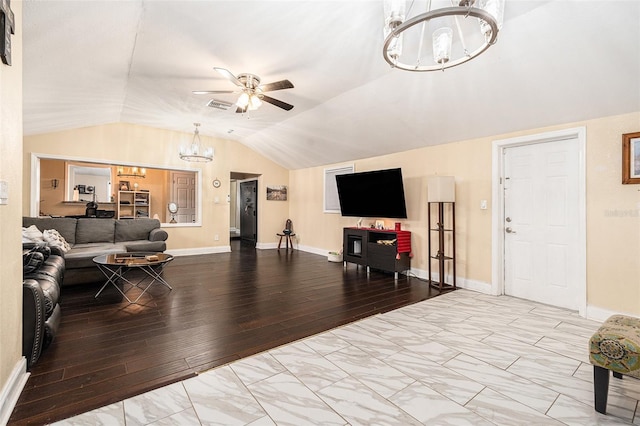 9220 Mcintosh Rd, Dover, FL 33527 - living room featuring a chandelier, a ceiling fan, lofted ceiling, and wood-type flooring