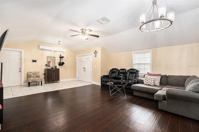 9220 Mcintosh Rd, Dover, FL 33527 - living room with a chandelier, a wall mounted AC, wood-type flooring, ceiling fan, and vaulted ceiling