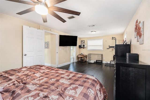 9220 Mcintosh Rd, Dover, FL 33527 - bedroom with dark wood-style flooring and a ceiling fan