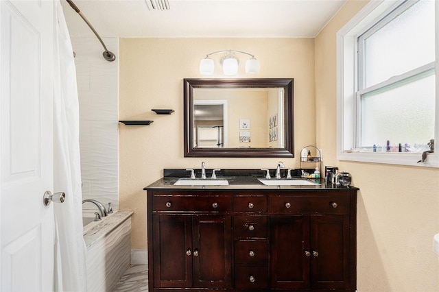 9220 Mcintosh Rd, Dover, FL 33527 - bathroom with double vanity, marble finish floors, and shower / bath combination with curtain