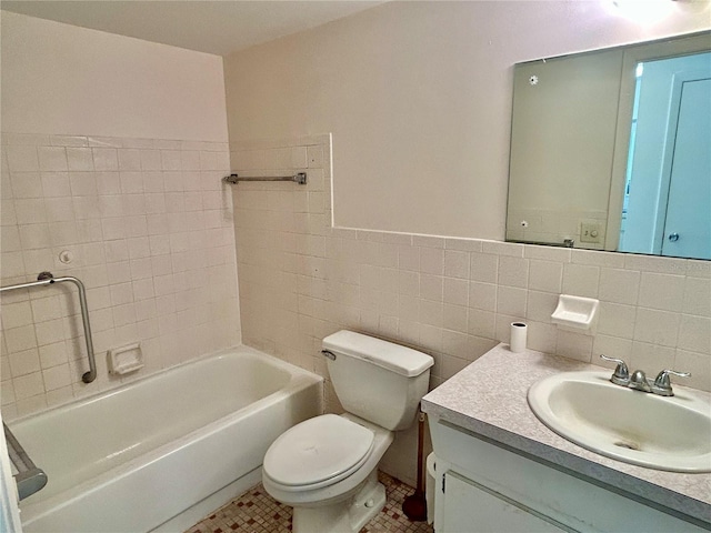 2391 Sumatran Way Unit 37, Clearwater, FL 33763 - bathroom featuring toilet, vanity, and tile walls